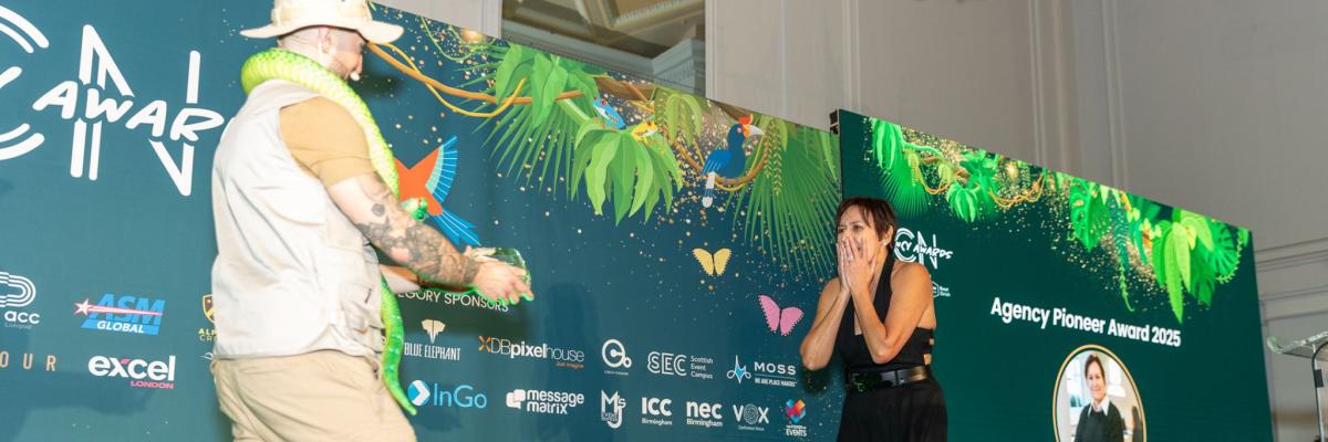 Catherine Turner on stage winning Agency pioneer award 2025